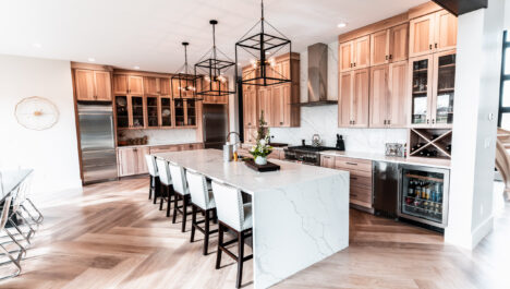 Modern Honey Hickory Kitchen Cabinets With White Countertops